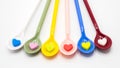 Multi color spoons with small heart shape foam