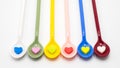 Multi color spoons with small heart shape