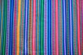 Multi color vivid tone stripe of Peruvian fabric for background Royalty Free Stock Photo