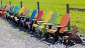 Multi colored adirondack chairs