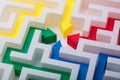 Multi Colored Arrows In The Centre Of Maze Royalty Free Stock Photo