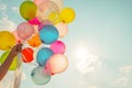 Multi colored balloons done with a retro vintage instagram filter effect Royalty Free Stock Photo