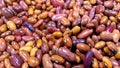 Multi-colored bean seed background with copy space