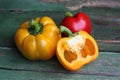 Multi-colored bell peppers on the background of boards Royalty Free Stock Photo