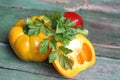 Multi-colored bell peppers on the background of boards Royalty Free Stock Photo
