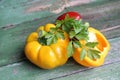 Multi-colored bell peppers on the background of boards Royalty Free Stock Photo