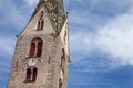 The multi colored bell tower of the church of Villandro in Val Isarco, Italy Royalty Free Stock Photo