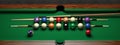 multi-colored billiard balls table cues Royalty Free Stock Photo