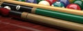 multi-colored billiard balls table cues Royalty Free Stock Photo