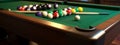 multi-colored billiard balls table cues Royalty Free Stock Photo