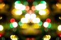 Multi-colored bokeh, blurred, unfocused on a black background. Abstract fuzzy image