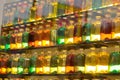 Multi-colored bottles in the window. Royalty Free Stock Photo