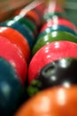 Multi Colored bowling balls lie in several rows Royalty Free Stock Photo