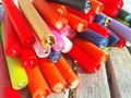 Multi-colored burnt candles lie in a row Royalty Free Stock Photo