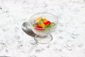 multi-colored candy lollipops in a bowl. Children's treat, sweets for tea. Montpensier