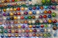 Multi-colored Christmas balls on a store counter Royalty Free Stock Photo