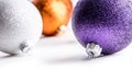 Multi colored christmas balls on white background. Royalty Free Stock Photo