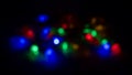 Multi colored Christmas theme lights blur in background Royalty Free Stock Photo