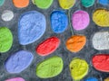 Multi colored circles on the concrete wall Royalty Free Stock Photo