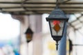 Multi colored classic hanging street lamp. outside Royalty Free Stock Photo