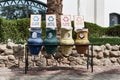 Multi colored clay jugs with ornaments as garbage bins for sorting waste in Egypt. Zero waste concept