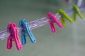 Multi-colored clips on the rope Royalty Free Stock Photo