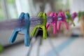 Multi-colored clips on the rope Royalty Free Stock Photo