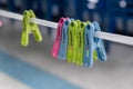 Multi-colored clips on the rope Royalty Free Stock Photo