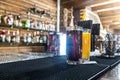 Multi-colored cocktails and soft drinks on a bar counter in glass glasses Royalty Free Stock Photo