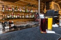 Multi-colored cocktails and soft drinks on a bar counter in glass glasses Royalty Free Stock Photo