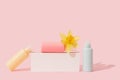 Multi colored containers for cosmetic bottle with flower, empty blank  for branding, Natural Beauty Royalty Free Stock Photo