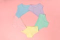 Multi-colored cotton panties for a girl on a pink background Royalty Free Stock Photo