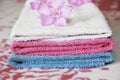 Multi-colored cotton white blue pink bath towels for the bathroom Royalty Free Stock Photo