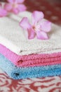 Multi-colored cotton white blue pink bath towels for the bathroom Royalty Free Stock Photo