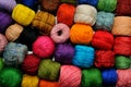 Multi-colored crochet-knitting threads, wound in many balls