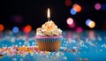 Multi colored cupcake with candle, icing, and decoration generated by AI Royalty Free Stock Photo