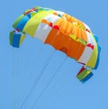 A multi-colored dome of a parachute in the sky as a background Royalty Free Stock Photo