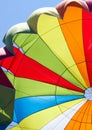 A multi-colored dome of a parachute in the sky as a background Royalty Free Stock Photo