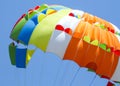 A multi-colored dome of a parachute in the sky as a background Royalty Free Stock Photo