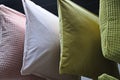 Multi-colored down soft pillows are shot close-up Royalty Free Stock Photo
