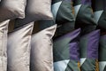 Multi-colored down soft pillows are shot close-up Royalty Free Stock Photo