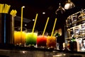 Multi-colored drinks in glass transparent glasses Royalty Free Stock Photo