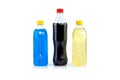 Multi colored drinks in plastic bottles on white background Royalty Free Stock Photo