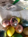 Multi-Colored Easter Eggs in a Paper Towel Lined Bowl Royalty Free Stock Photo