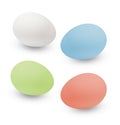 Multi-colored Easter eggs. White isolated background.Side top view.