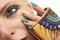 Multi-colored fashionable makeup and manicure