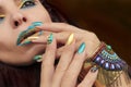 Multi-colored fashionable makeup and manicure