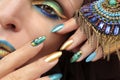 Multi-colored fashionable makeup and manicure