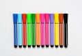 Multi colored felt tip pens on white background Royalty Free Stock Photo