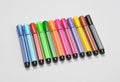 Multi colored felt tip pens on white background Royalty Free Stock Photo